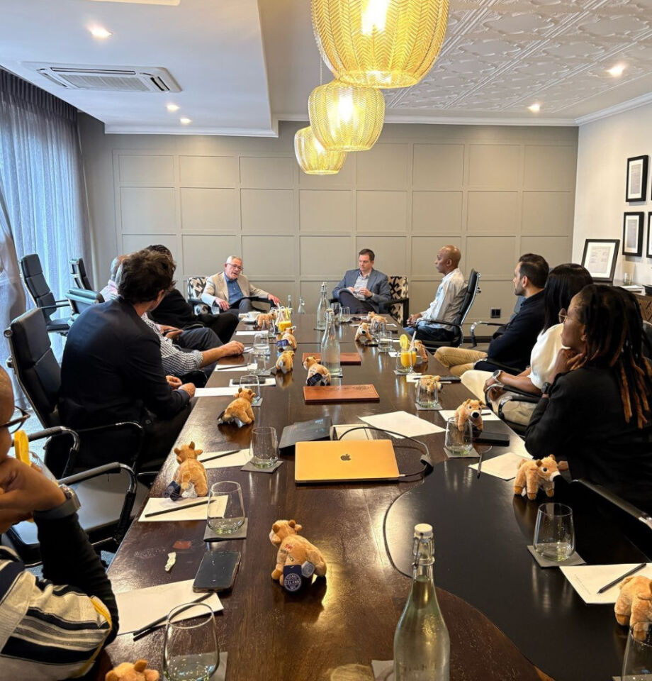 Group of people sitting at a roundtable event